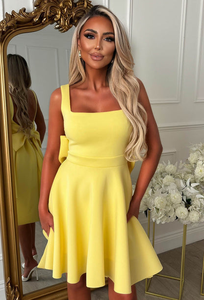 Adore Me More Lemon Bow Back Mini Dress