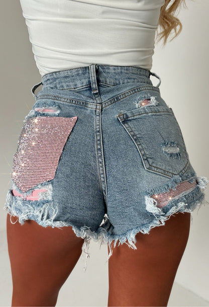Bring On The Drama Mid Wash Ripped Denim Hot Fix Pink Pocket Shorts